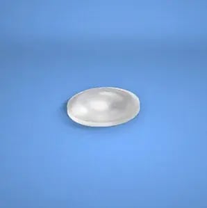 Clear domed frameless cabinet bumper, part I-1164, on a blue background