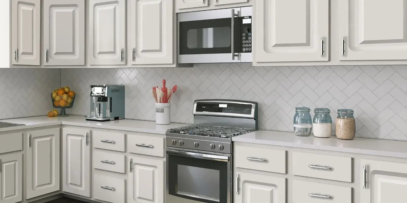 Kitchen with DuraFuse Curved Raised cabinet doors in Powder