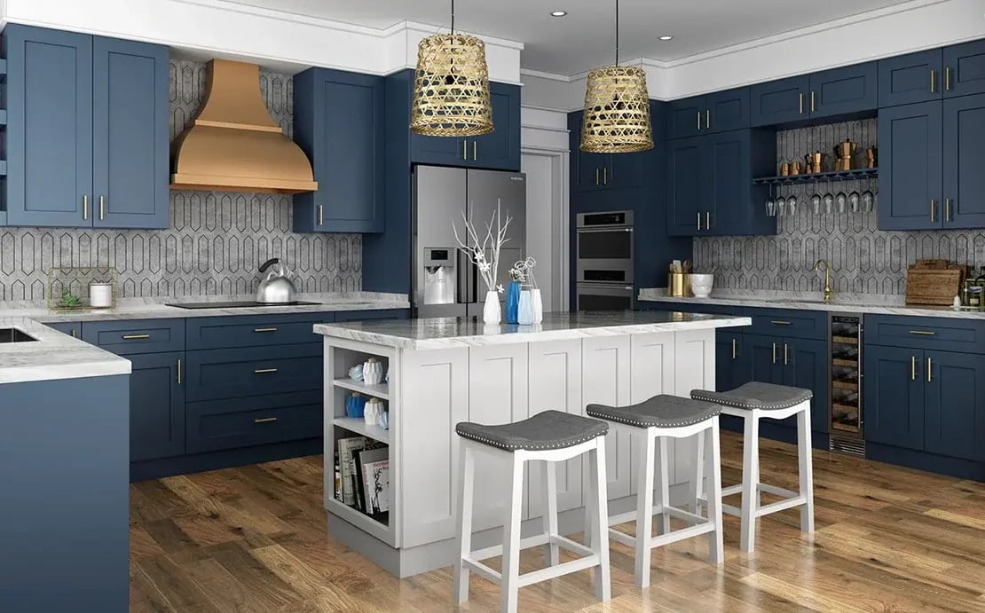 A kitchen with deep blue painted shaker cabinets and a white island