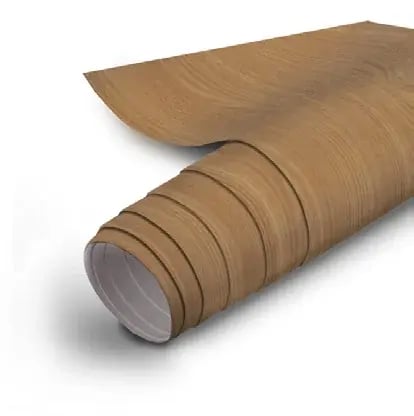 A rolled length of Qwikkit woodgrain peel and stick cabinet film