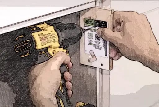 Drilling hinge plate pilot holes inside a frameless cabinet using the locator
