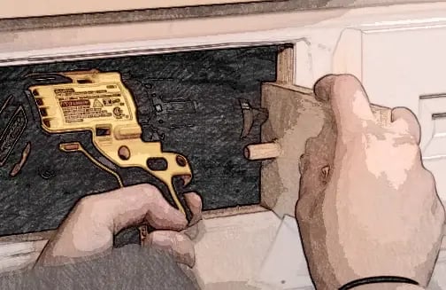 Drilling false front pilot holes with the cabinet pilot hole locator